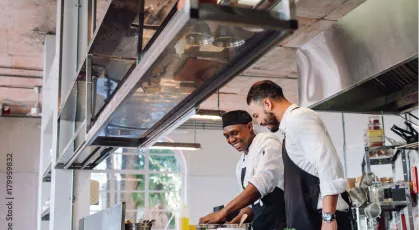 Chefs working in kitchen