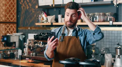 Business owner on phone